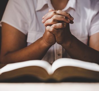 Christian life crisis prayer to god. Woman Pray for god blessing to wishing have a better life. woman hands praying to god with the bible. begging for forgiveness and believe in goodness.
